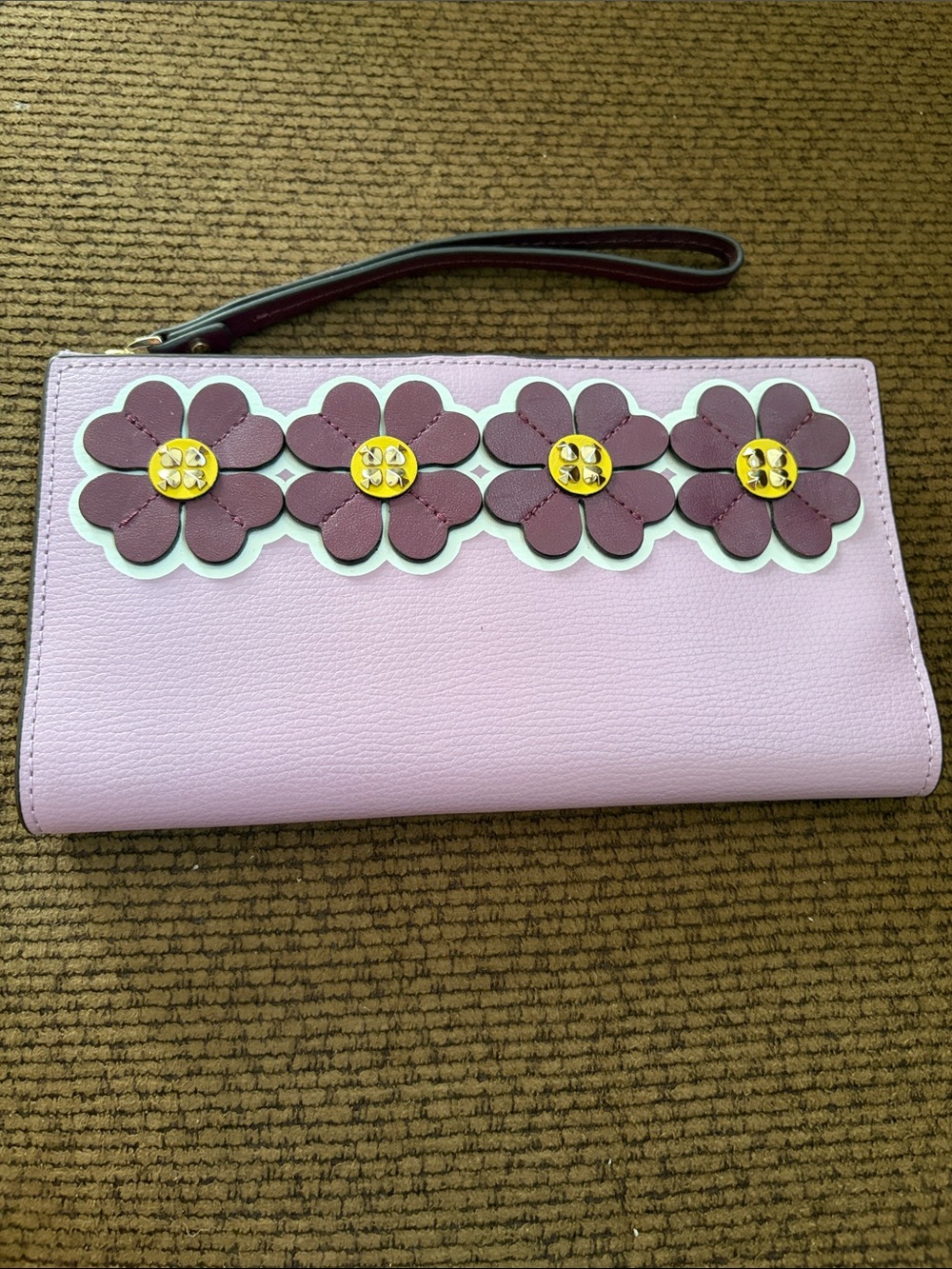 kate spade Lavender wristlet clutch with maroon Floral Appliqué.